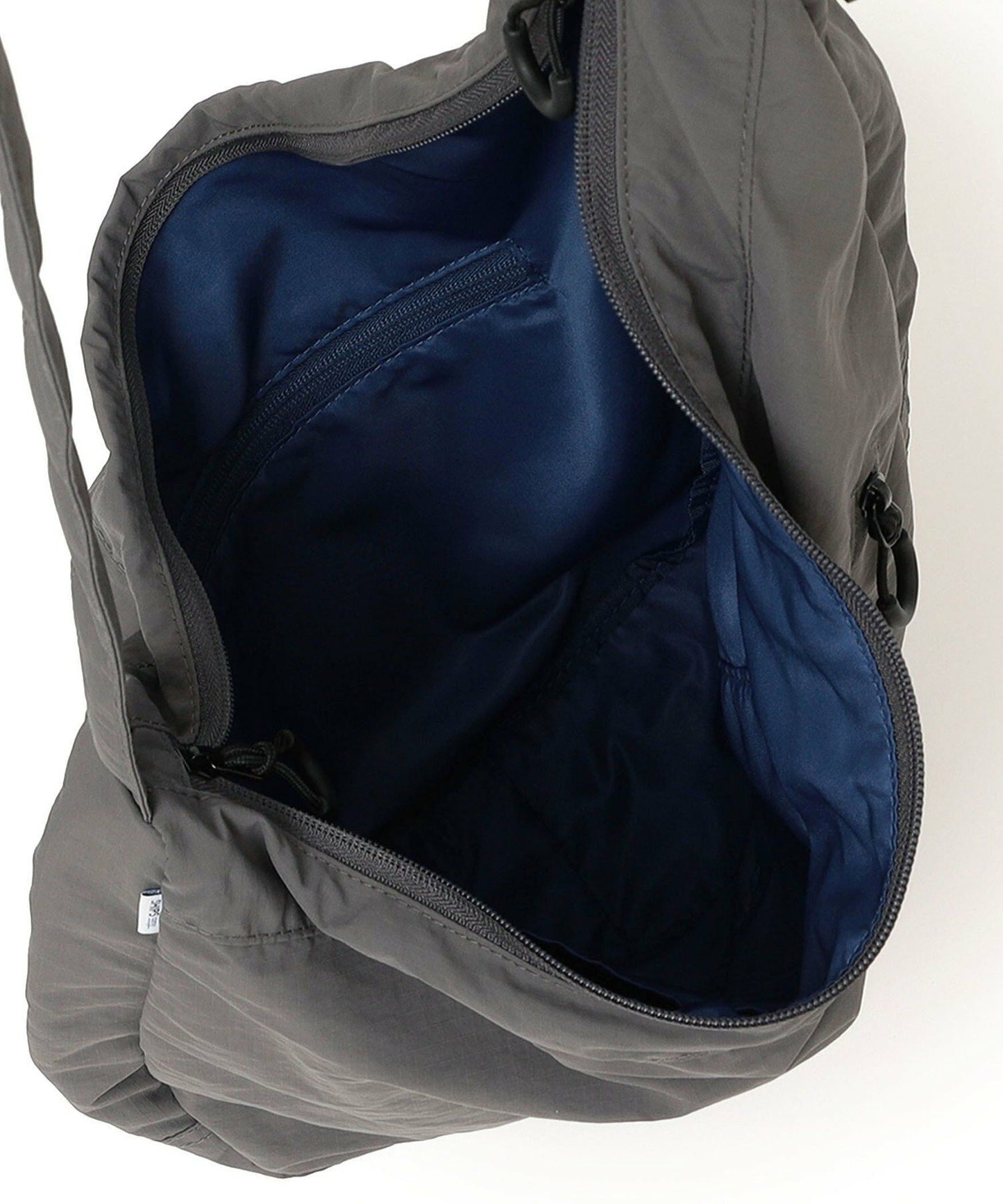 【SHIPS】SHIPS any系列 防撕裂尼龍前開拉鏈 半月型斜背包